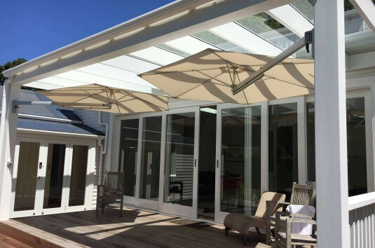 Wall mount umbrellas under patio