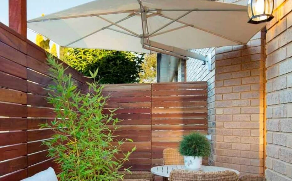 An example of a wall mounted cantilever umbrella