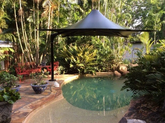 Black Umbrella on Resort's pool